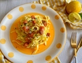 TAGLIATELLE AL SALMONE CON SFERE DI PROSECCO