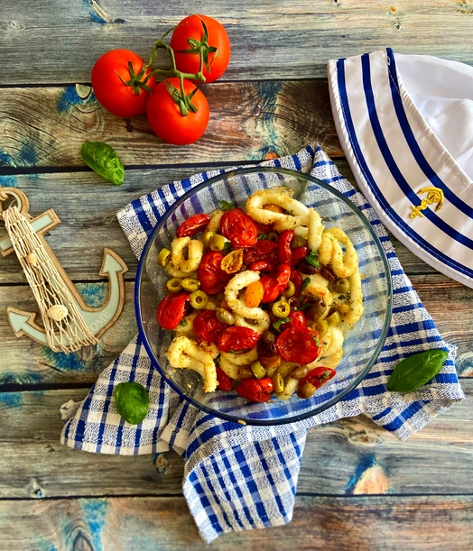 CALAMARI GRATINATI CON POMODORI E OLIVE
