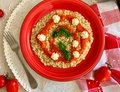 RISOTTO CON MELANZANA, POMODORO, ROBIOLA