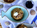 SPAGHETTI CON AGLIO NERO, ACCIUGHE E BURRATA